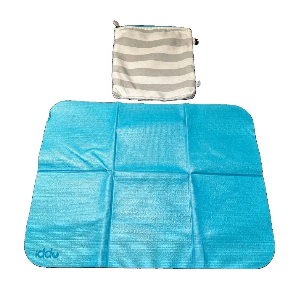 Ubbi On-The-Go Baby Diaper Changing Mat, Portable Foldable Travel Pad